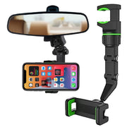 A black and green phone holder attached to a car's rearview mirror, with a phone displaying app icons, and the holder