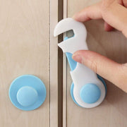 Child safety lock securing a refrigerator door, protecting food and contents.