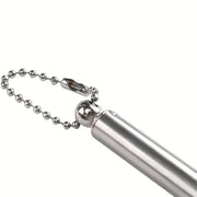 Close-up of the silver ball chain and the end of the silver telescoping handle of the back scratcher.