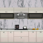 A modern kitchen with white and grey marble pattern self-adhesive wallpaper applied to the backsplash.