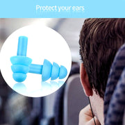 A person's ear is visible with a light blue earplug, with an inset showing a pair of light blue earplugs.