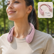 A smiling woman outdoors wearing a pink bladeless neck fan, with an inset showing the fan and USB cable.