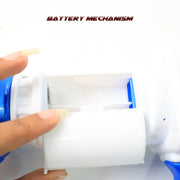 A hand opens the battery compartment of the white plastic bubble gun, revealing the empty slot.