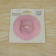 Silicone drain cover in its retail card packing, ready for purchase.