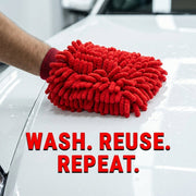A hand wearing a red microfiber chenille wash glove cleans the white hood of a car, with the text 