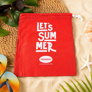 A red drawstring bag with 