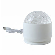 A white LED projection light with a clear textured dome and a white USB cable on a white background.
