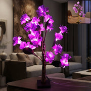 Artificial flower LED decorative lamp glowing on a table