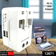 White universal travel adapter with its packaging, a small instruction booklet, and a gray pouch.