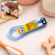 A light blue baby nail clipper with a yellow and white owl design, shown with an inset of it being used.