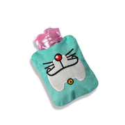 A light blue hot water bag with a Doraemon face design and pink bottle top is angled on a white background.