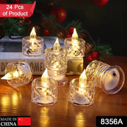 Six clear acrylic flameless LED tealight candles with warm yellow light, some on a book, against a festive background.