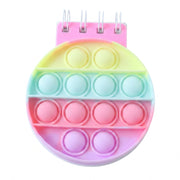 A rainbow pop-it fidget notebook with a pink spiral binding and pastel colored bubbles on a white background.
