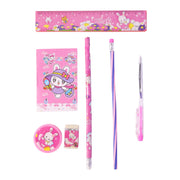 A pink rabbit-themed stationery set, including a ruler, notebook, two pencils, a pen, a sharpener, and an eraser, displayed