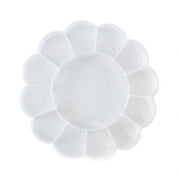 Top-down view of an empty, clear, flower-shaped plastic organizer box with 13 compartments on a white background.