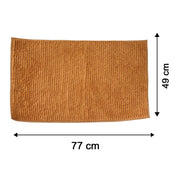 A flat, rectangular brown bobble mat is shown with arrows indicating its length of 77 cm and width of 49 cm.