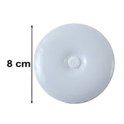 A white, round LED light with a central power button, showing a measurement of 8 cm in diameter