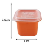 A single orange square silicone mold with a clear lid, showing its dimensions: 4.5 cm high and 5 cm wide.