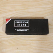 Black cardboard box with red and white text for 