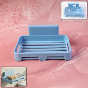 Light blue plastic soap dish on a pink marble background, with an inset showing the dish in packaging.