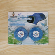 Two blue toilet cleaner tablets in blister packaging, labeled 