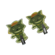 Two green cartoon goblin-like characters with hats, acting as wall hooks, against a white background.
