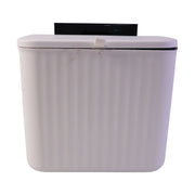 A white ribbed compost bin with a closed lid and black mounting bracket is shown on a white background.