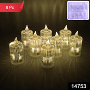 Eight clear ribbed LED flameless candles with warm glow on a dark surface, with an inset of the candles in their case.