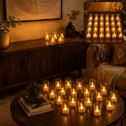 A living room scene with 24 LED flameless candles in transparent covers on a coffee table and sideboard, glowing warmly.