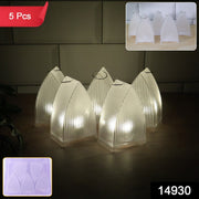 Five clear plastic ribbed lanterns with warm LED lights on a wooden surface, with an inset showing the plastic mold.