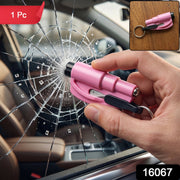 A hand uses a pink emergency tool to shatter a car window, with a 